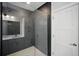 Contemporary bathroom with a glass-enclosed shower, modern vanity, and stylish gray finishes at 1316 W Carmen St # 2, Tampa, FL 33606