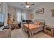 Cozy bedroom with a workstation, musical instruments, and comfortable decor at 16406 Chapman Crossing Dr, Lithia, FL 33547