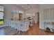 Bright kitchen with stainless steel appliances, bar stool seating, and sleek, modern finishes at 16406 Chapman Crossing Dr, Lithia, FL 33547