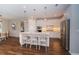 Modern kitchen featuring recessed lighting, stainless steel appliances, a large island with seating and pendant lights at 19877 Sea Glass Cir, Land O Lakes, FL 34638