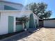Charming house exterior with a well-manicured garden and a private driveway at 2068 San Marino N Way, Clearwater, FL 33763