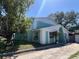 Charming two-story home with a unique architectural design and mature trees at 2068 San Marino N Way, Clearwater, FL 33763