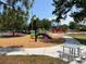 Community playground with wood chip ground cover and play equipment at 2068 San Marino N Way, Clearwater, FL 33763