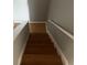 A view of carpeted stairs leading to the upper level of the home at 2068 San Marino N Way, Clearwater, FL 33763
