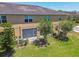 The back of this townhome features a covered patio, perfect for entertaining, and has lush landscaping at 2234 Lennox Dale Ln, Brandon, FL 33510