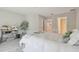 Bedroom featuring white linens, bright walls, and light-colored flooring at 2234 Lennox Dale Ln, Brandon, FL 33510