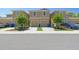 View of two-story townhomes featuring attached garages, manicured lawns, and inviting curb appeal at 2234 Lennox Dale Ln, Brandon, FL 33510