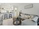 Cozy living room with neutral decor, tile floors and opening to the eat-in kitchen at 2234 Lennox Dale Ln, Brandon, FL 33510