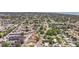 An aerial view showing a neighborhood with tree-lined streets and houses near the bay at 2401 66Th S Ave, St Petersburg, FL 33712