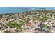 Aerial view of a residential community featuring a home with a pool and easy access to the bay at 2401 66Th S Ave, St Petersburg, FL 33712