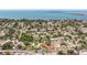 Overhead view of a residential community featuring a home with a pool and easy access to the bay at 2401 66Th S Ave, St Petersburg, FL 33712