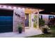 Charming home exterior at night with inviting entrance, stylish accents, and well-lit landscaping at 2401 66Th S Ave, St Petersburg, FL 33712