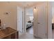 Hallway leading to bedroom with hardwood flooring at 2401 66Th S Ave, St Petersburg, FL 33712