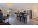Bright kitchen showcases white cabinets, stainless steel appliances, breakfast bar and view of pool at 2401 66Th S Ave, St Petersburg, FL 33712