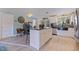 Open concept kitchen with stone countertops, stainless appliances and breakfast bar at 2401 66Th S Ave, St Petersburg, FL 33712