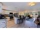 Modern kitchen offers white cabinets, stainless appliances, breakfast bar, and convenient open floorplan at 2401 66Th S Ave, St Petersburg, FL 33712