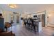 Bright and airy kitchen with white cabinets, stainless steel appliances, and a breakfast bar at 2401 66Th S Ave, St Petersburg, FL 33712