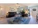 Comfortable living room features recessed lighting, lots of seating, and natural light throughout at 2401 66Th S Ave, St Petersburg, FL 33712
