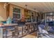 Backyard poolside kitchen features custom woodwork and stainless-steel appliances at 2401 66Th S Ave, St Petersburg, FL 33712