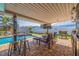 Entertainers dream poolside patio with full bar, grilling area, and outdoor television at 2401 66Th S Ave, St Petersburg, FL 33712
