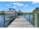 Private boat dock ready for summer boating at 261 Kentucky Ave, Crystal Beach, FL 34681