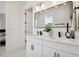 Modern bathroom with double vanity, large mirror and contemporary fixtures at 2758 5Th S Ave, St Petersburg, FL 33712