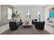 Bright living room featuring neutral tones, modern furnishings, and ample natural light at 2758 5Th S Ave, St Petersburg, FL 33712