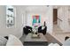 Stylish living room showcasing a modern design, bright decor, and staircase access at 2758 5Th S Ave, St Petersburg, FL 33712