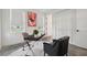 Bright office space featuring a modern desk, chic seating, and a neutral color palette for a professional atmosphere at 2758 5Th S Ave, St Petersburg, FL 33712