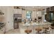 Well-equipped kitchen featuring an island with seating, modern appliances, and ample counter space at 29807 Imperati Blvd, Wesley Chapel, FL 33543