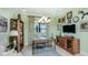 Comfortable office with neutral paint, a large desk, a big window, and shelving for decor at 29807 Imperati Blvd, Wesley Chapel, FL 33543