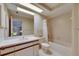 Bathroom with tub, vanity, and medicine cabinet at 29903 Baywood Ln, Wesley Chapel, FL 33543