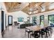 Bright living area boasts a hardwood ceiling, dining table and plenty of natural light at 3440 Crenshaw Lake Rd, Lutz, FL 33548