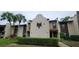 Exterior of a multi-Gathering building with well-maintained landscaping, showcasing its appealing curb appeal and design at 3505 Tarpon Woods Blvd # P408, Palm Harbor, FL 34685