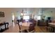 Dining area offering open space and natural light with sightlines to the living room and the outdoors at 3505 Tarpon Woods Blvd # P408, Palm Harbor, FL 34685