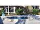Inviting hot tub with surrounding landscaping and paved patio area at 3505 Tarpon Woods Blvd # P408, Palm Harbor, FL 34685