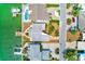 Waterfront homes with lush landscaping and boat docks highlighting the desirable location at 365 La Hacienda Dr, Indian Rocks Beach, FL 33785