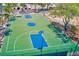 Overhead shot of a vibrant basketball court, an ideal setting for sports and recreation, complete with hoops and markings at 365 La Hacienda Dr, Indian Rocks Beach, FL 33785