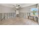 Spacious bedroom with natural light and views, featuring unfinished walls ready for customization and design at 365 La Hacienda Dr, Indian Rocks Beach, FL 33785