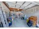 Spacious garage with ample storage space and potential for a workshop or parking at 365 La Hacienda Dr, Indian Rocks Beach, FL 33785