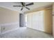 Cozy bedroom with neutral walls, plush carpet, and abundant natural light at 4014 Pleasant Ridge Dr, New Port Richey, FL 34652