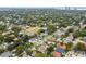 An aerial view showcases the area's residential character, green canopy, and access to city amenities at 4206 W Sevilla St, Tampa, FL 33629