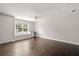 Spacious bedroom boasts hardwood floors, a ceiling fan, and a built-in desk by the window at 4206 W Sevilla St, Tampa, FL 33629