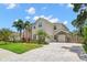 Elegant two-story home featuring a brick driveway, a 2-car garage, and manicured landscaping at 4206 W Sevilla St, Tampa, FL 33629
