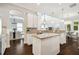 Bright kitchen area with stainless steel appliances, white cabinets and granite countertops at 4206 W Sevilla St, Tampa, FL 33629