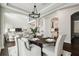 Living room with modern decor flows seamlessly into the dining room and kitchen at 4206 W Sevilla St, Tampa, FL 33629