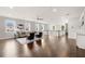 Bright and airy loft featuring hardwood floors, comfortable seating, and plenty of natural light at 4206 W Sevilla St, Tampa, FL 33629