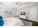 Spacious main bedroom with a view into ensuite bathroom, ample natural light, and neutral decor at 4206 W Sevilla St, Tampa, FL 33629