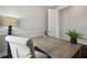 Spacious home office with natural lighting, dark floors, and neutral wall colors at 4206 W Sevilla St, Tampa, FL 33629