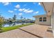 The backyard features a canal view and brick patio at 4425 13Th Ne Way, St Petersburg, FL 33703